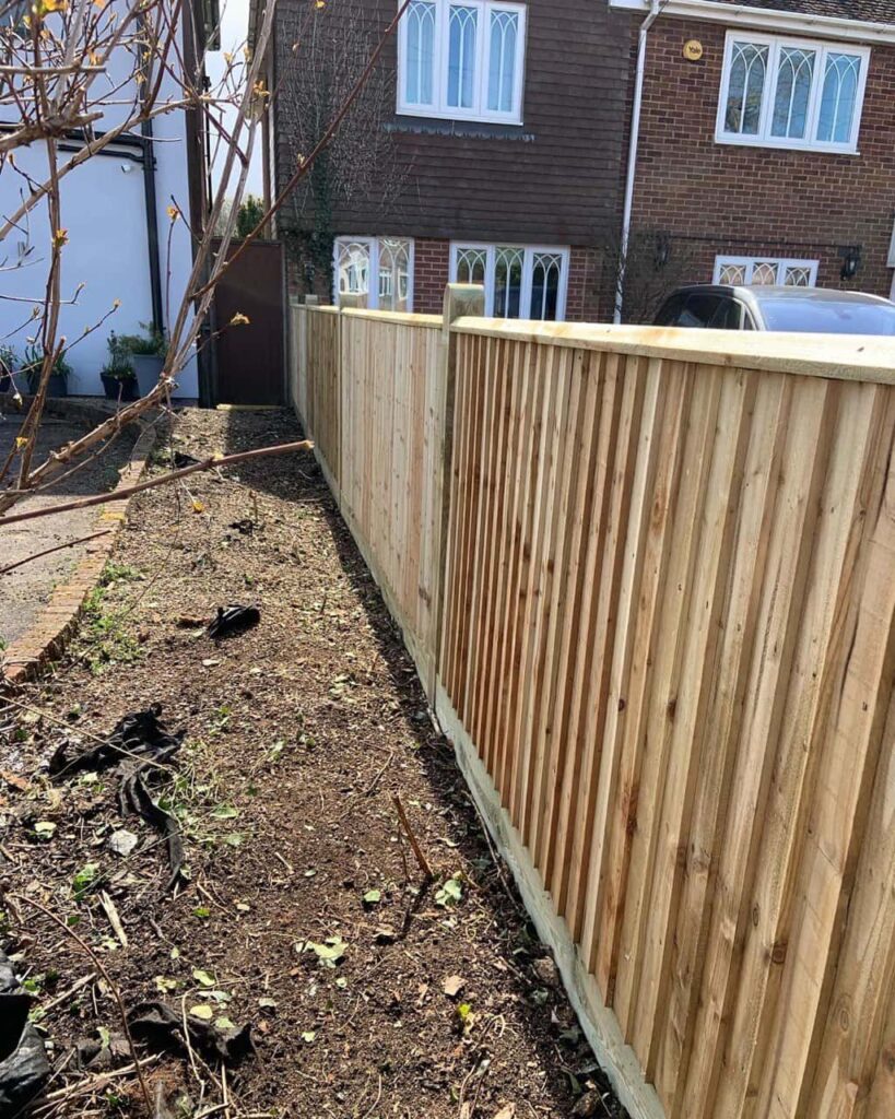 This is a photo of feather edge fencing installed in a residential property by Fast Fix Fencing Milton
