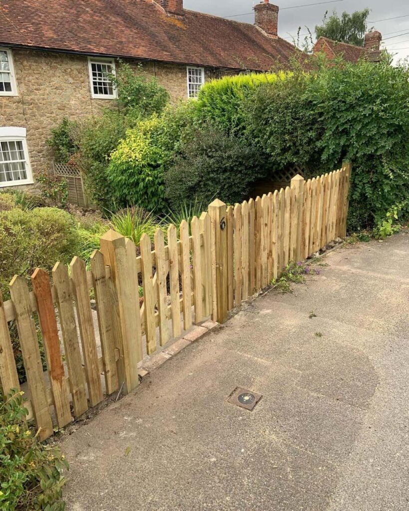 This is a photo of a picket fence and picket gate installed by Fast Fix Fencing Milton